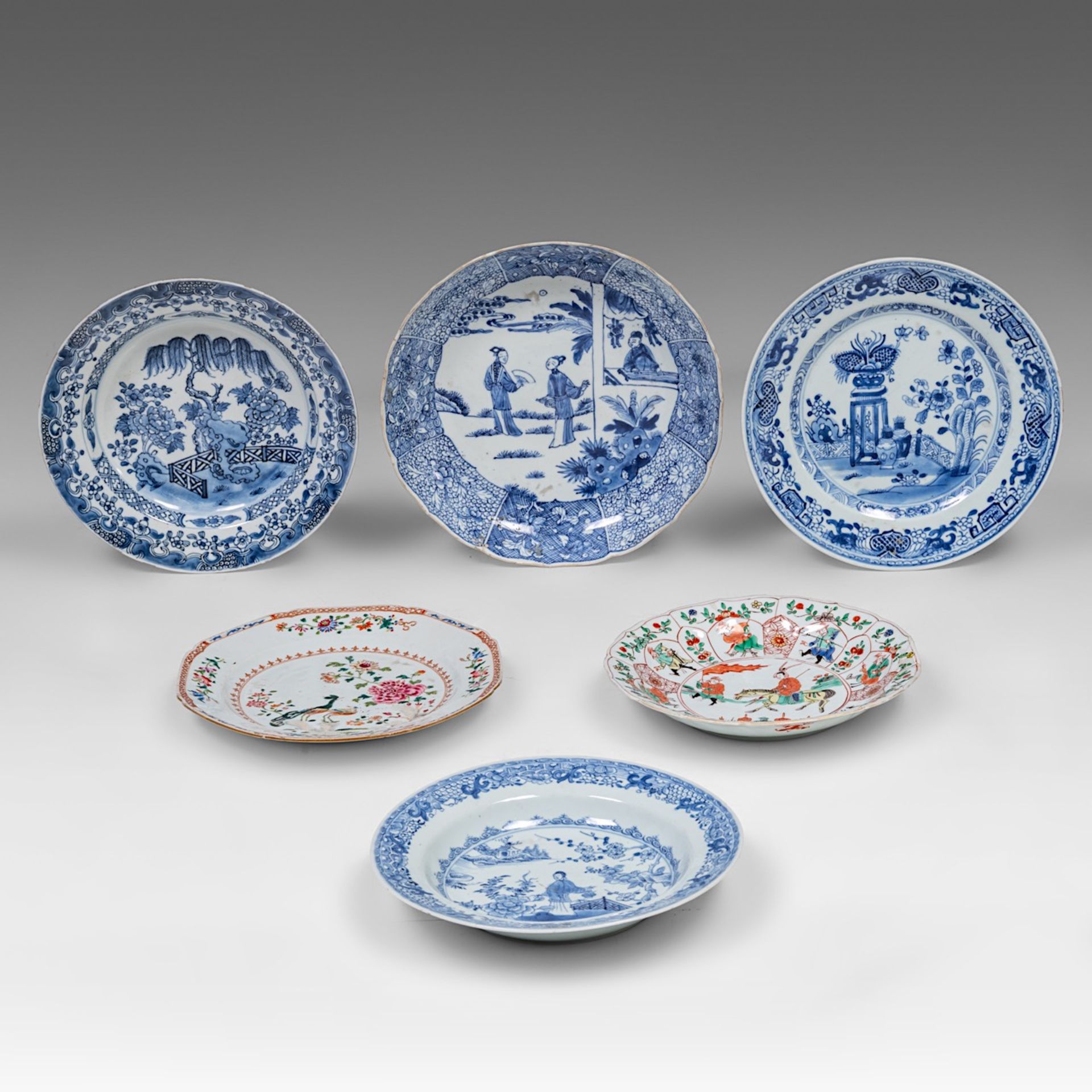 A small collection of six Chinese blue and white, famille verte and famille rose dishes, Kangxi and