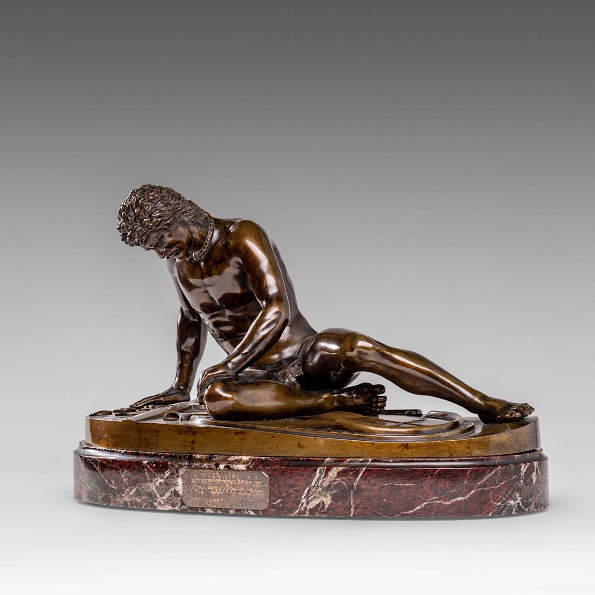 A brown patinated bronze sculpture of 'The Dying Gaul', 1871, presented on a marble base, H 22,5 - W - Image 3 of 11