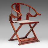 A Chinese hardwood horseshoe-back armchair, late Qing, H 106,5 - W 77 cm