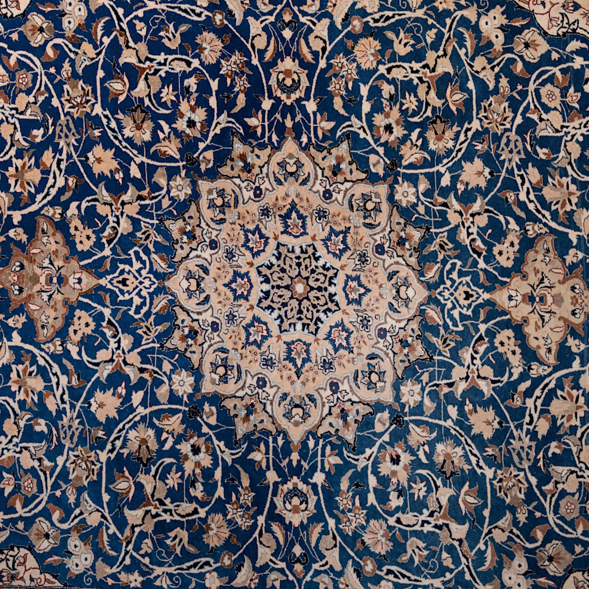 A Persian Nain woollen rug with a central medallion, 229 x 169 cm - Image 8 of 8