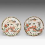 A pair of Chinese famille verte 'Phoenix' chargers, Kangxi period, dia 39 cm