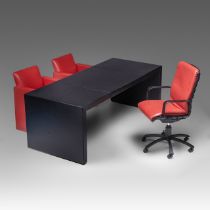A design leather bureau set by Poltrona Frau, a desk and three chairs