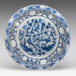 A Chinese blue and white 'Pheasants amongst vines' carved and barbed charger, Yuan style, dia 45,5 c