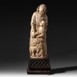 An ivory sculpture depicting the sacrifice of Isaac, Paris, late 19th/early 20thC, H 45,5 cm - total