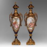 An imposing pair of Sevres vases, with gallant scenes and gilt brass mounts, H 53 cm