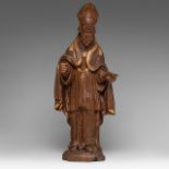 An oak sculpture of a bishop making his blessing, with gilt details, 17thC, H 71 cm