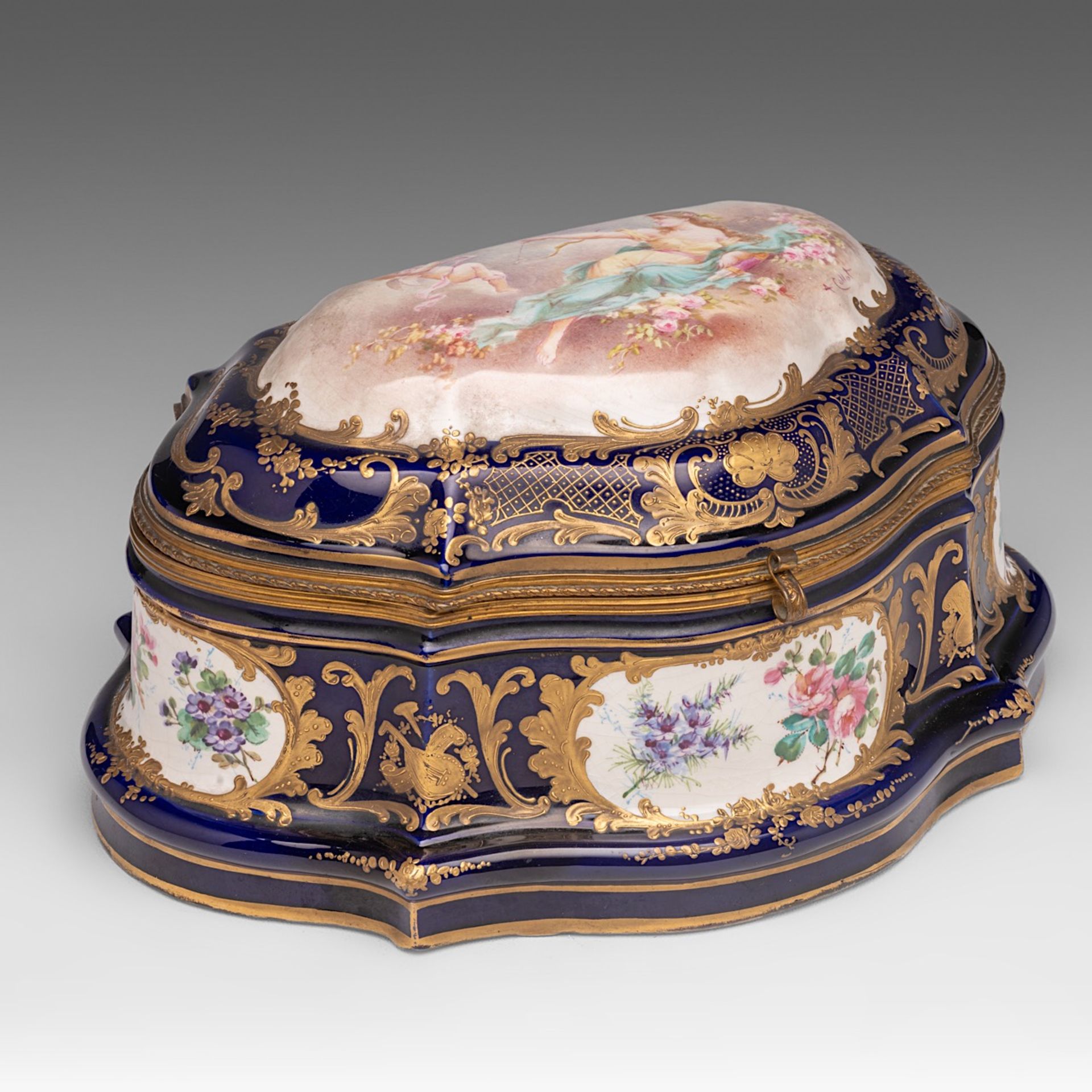 A fine bleu royale ground Sevres box with gilt decoration and hand-painted roundels, signed A. Collo