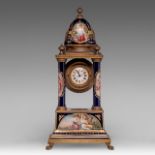 A fine brass and Viennese porcelain column table clock, with hand-painted garden scenes, H 32 cm