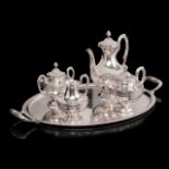 A four-part Wiskemann Neoclassical silver-plated coffee and tea set on a matching Christofle 'Malmai