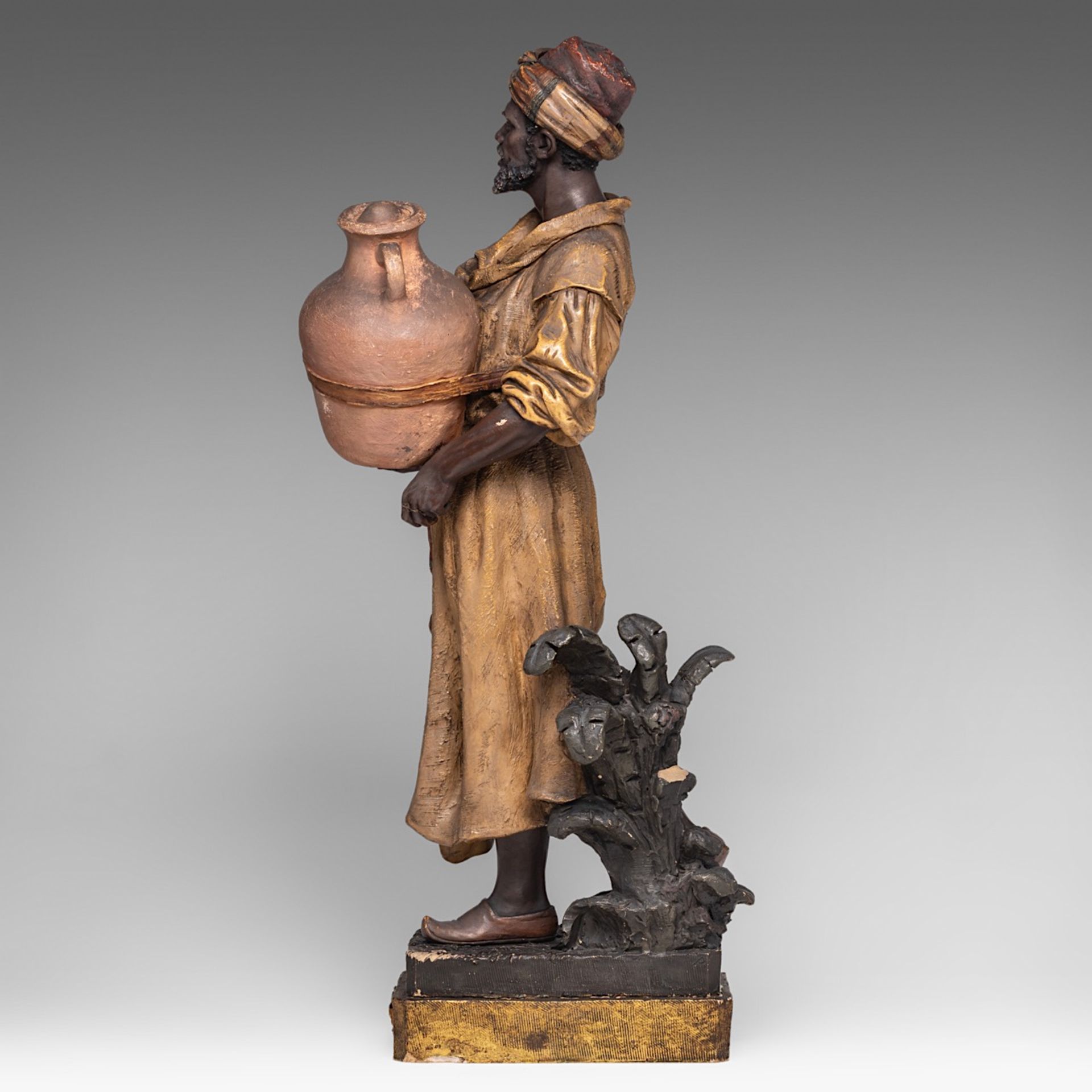 A polychrome terracotta sculpture of an Arab offering water, Goldscheider, Vienna H 65 cm - Image 3 of 8