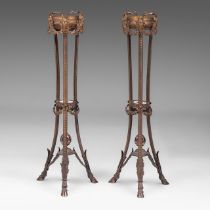 A pair of Louis XVI style gilt brass pedestals with porcelain plaques, H 115 cm