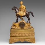 A Charles X mantle clock with an orientalist horseback rider on top, gilt and patined bronze, ca. 18