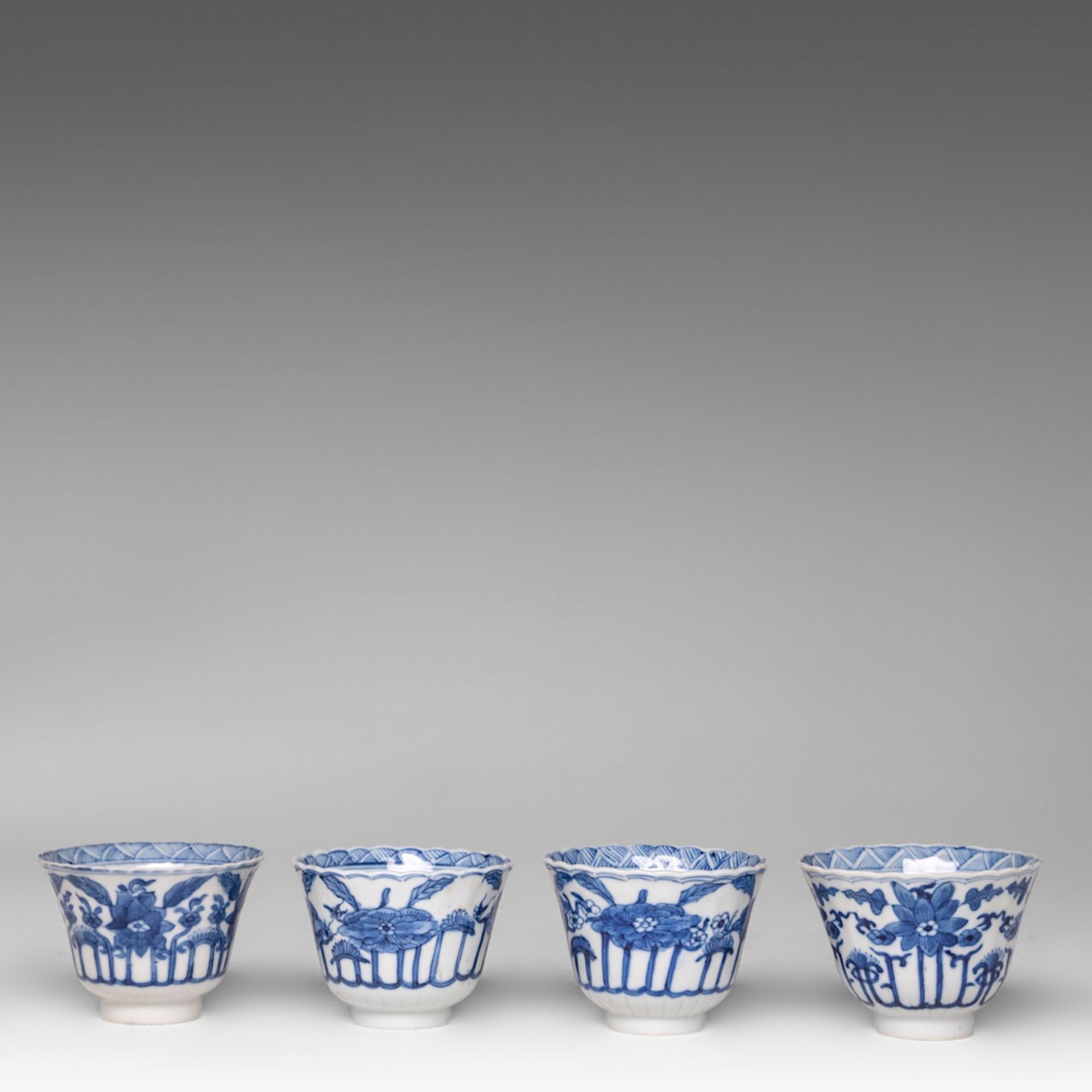 Six matching sets of Chinese blue and white floral decorated tea cups and saucers, Kangxi period, di - Image 3 of 17