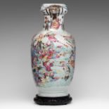 A Chinese famille rose 'Immortal battle scene' vase, 19thC, H 50 cm