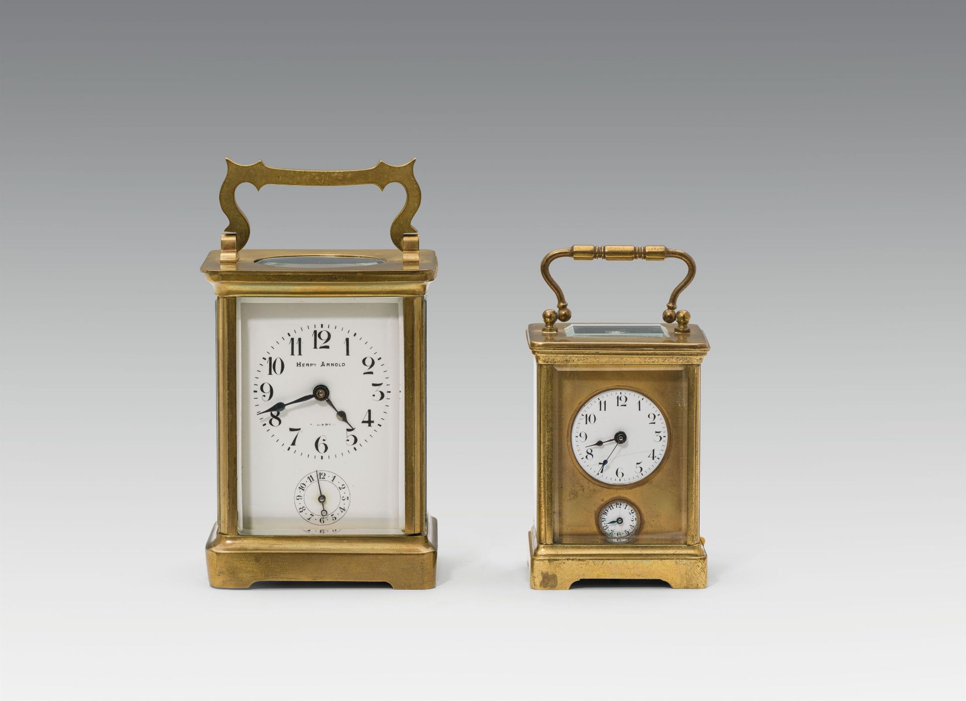 Two travel clocks with alarm