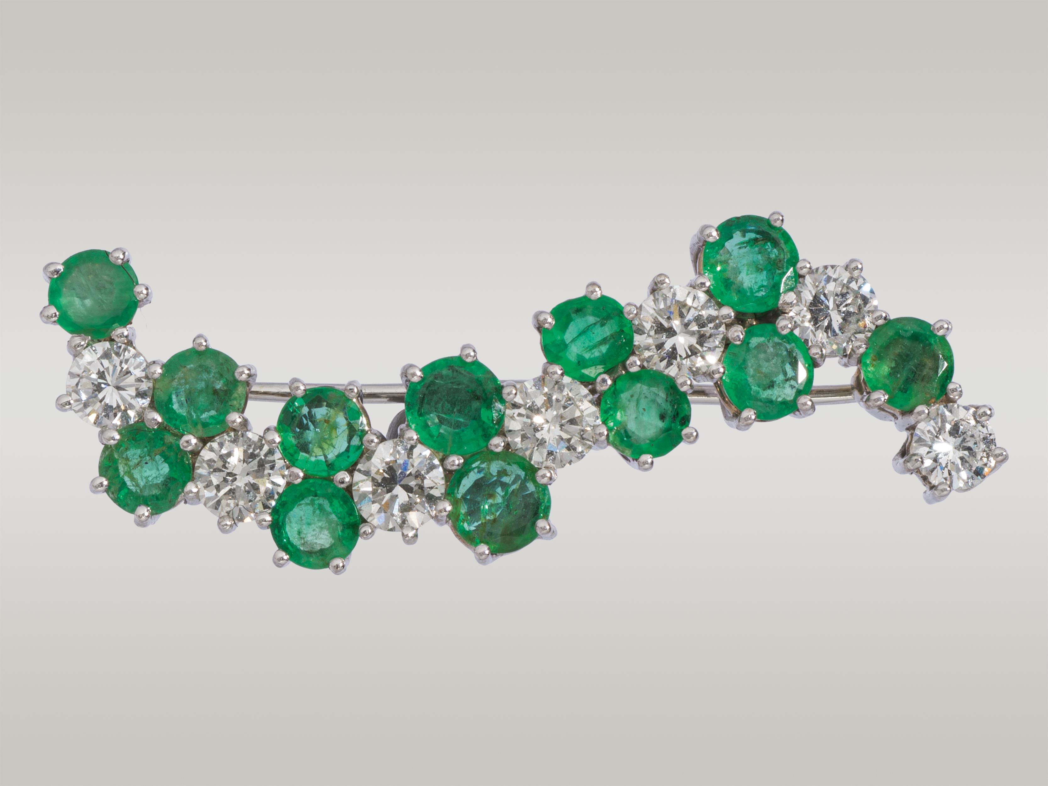 Emerald brooch with diamonds