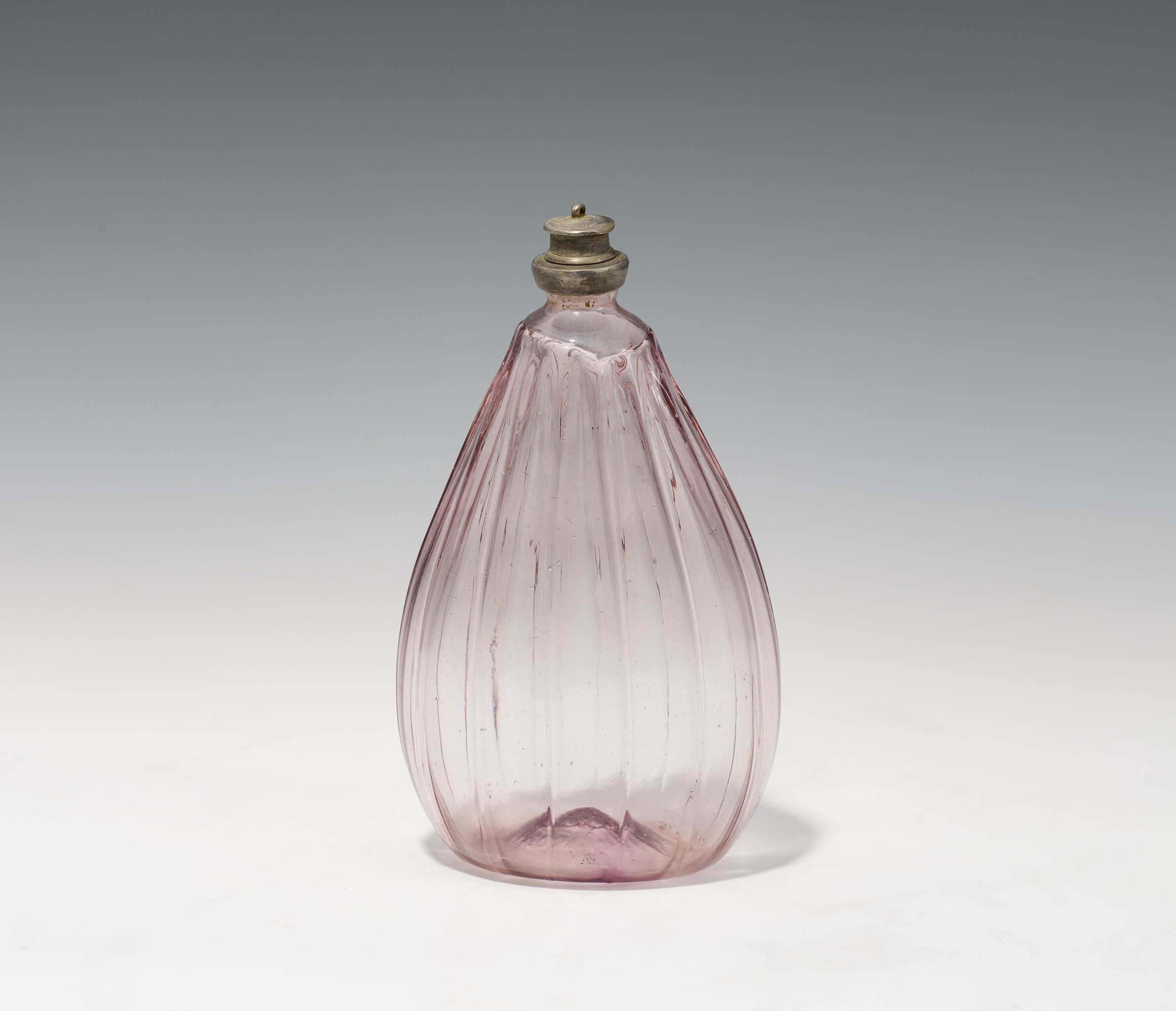 Bottle18th centuryrosafarbenes glass; tearing scar at the bottom; pewter mounting with screw caph.