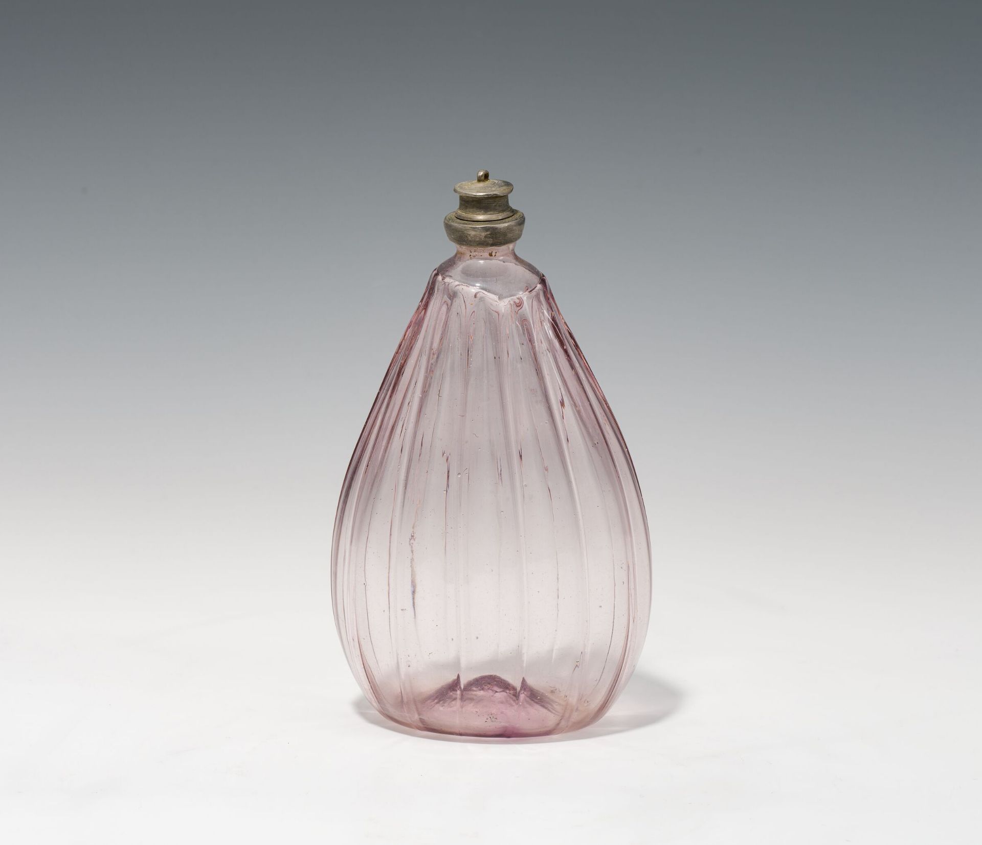 Bottle18th centuryrosafarbenes glass; tearing scar at the bottom; pewter mounting with screw caph.