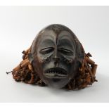 Maske, "mwana pwo", Chokwe, Kongo, Afrika, Holz, dunkelbraun patiniert, Pflanzenfaser, Bastschnur,