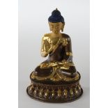 Buddha Amoghasiddhi, Tibet/Nepal, 2. Hälfte 20. Jh., Kupferbronze, stellenweise vergoldet, Gesicht