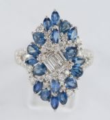 Ring, WG 750, Brillanten und Diamanten zus. ca. 0.87 ct., etwa tw/vs-si, 18 Saphire zus. ca. 2.40 c