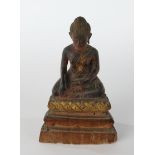Buddha Amida, Südostasien, 19./20. Jh., Holz, geschnitzt, stellenweise vergoldet. 15 cm hoch, gerin
