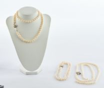 3 Perlenketten, WG-Schließen 585, 66 cm/ 70cm, teils lose