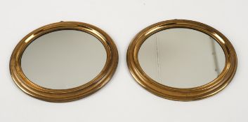 Paar Wandspiegel, 19. Jh., gekehlte Messingleiste, oval, 31 x 35.5 cm