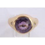 Herrenring, GG 750, Amethyst, seitlich je ein Brillant zusammen. 0.05 ct., Gesamtgewicht ca. 12.8 g