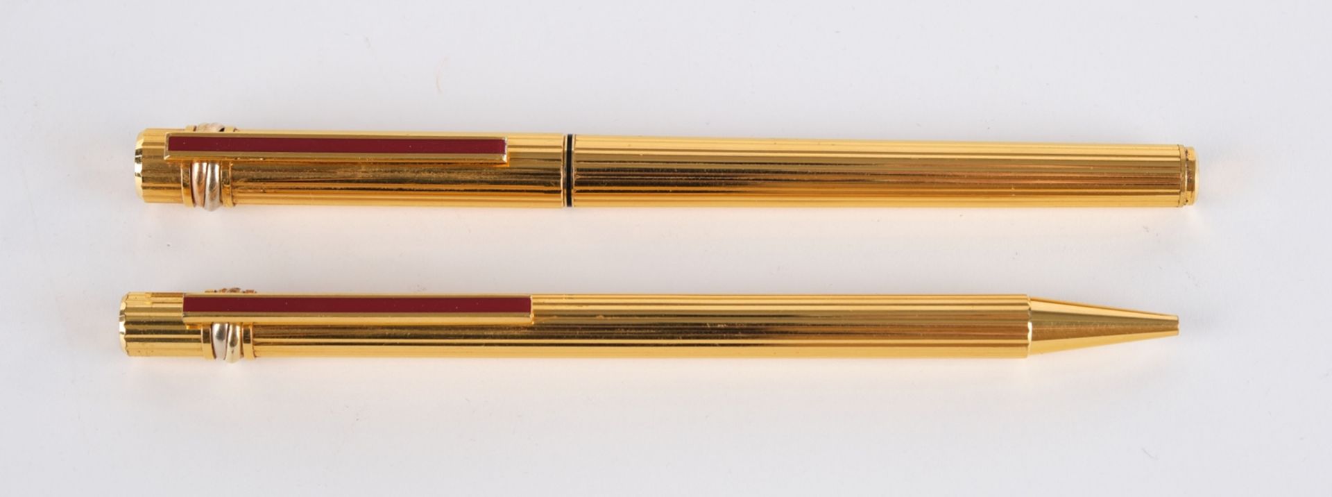 Kugelschreiber, Füllfederhalter, "Trinity", Must de Cartier, vergoldet, Rillendekor, Clips mit rote - Image 2 of 4