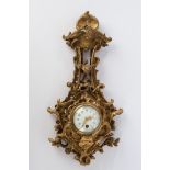 Cartel-Uhr, Paris, um 1900, Holz, geschnitzt, vergoldet, Prägestempel Cacaut Paris, rundes Uhrgehäu