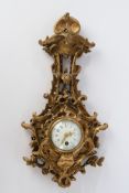 Cartel-Uhr, Paris, um 1900, Holz, geschnitzt, vergoldet, Prägestempel Cacaut Paris, rundes Uhrgehäu