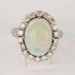 Ring, WG 750, 18 Brillanten, zus. ca. 0,90ct, Opal-Cabochon (geklebt), ca. 5ct, ca. 7,9g, RM 56