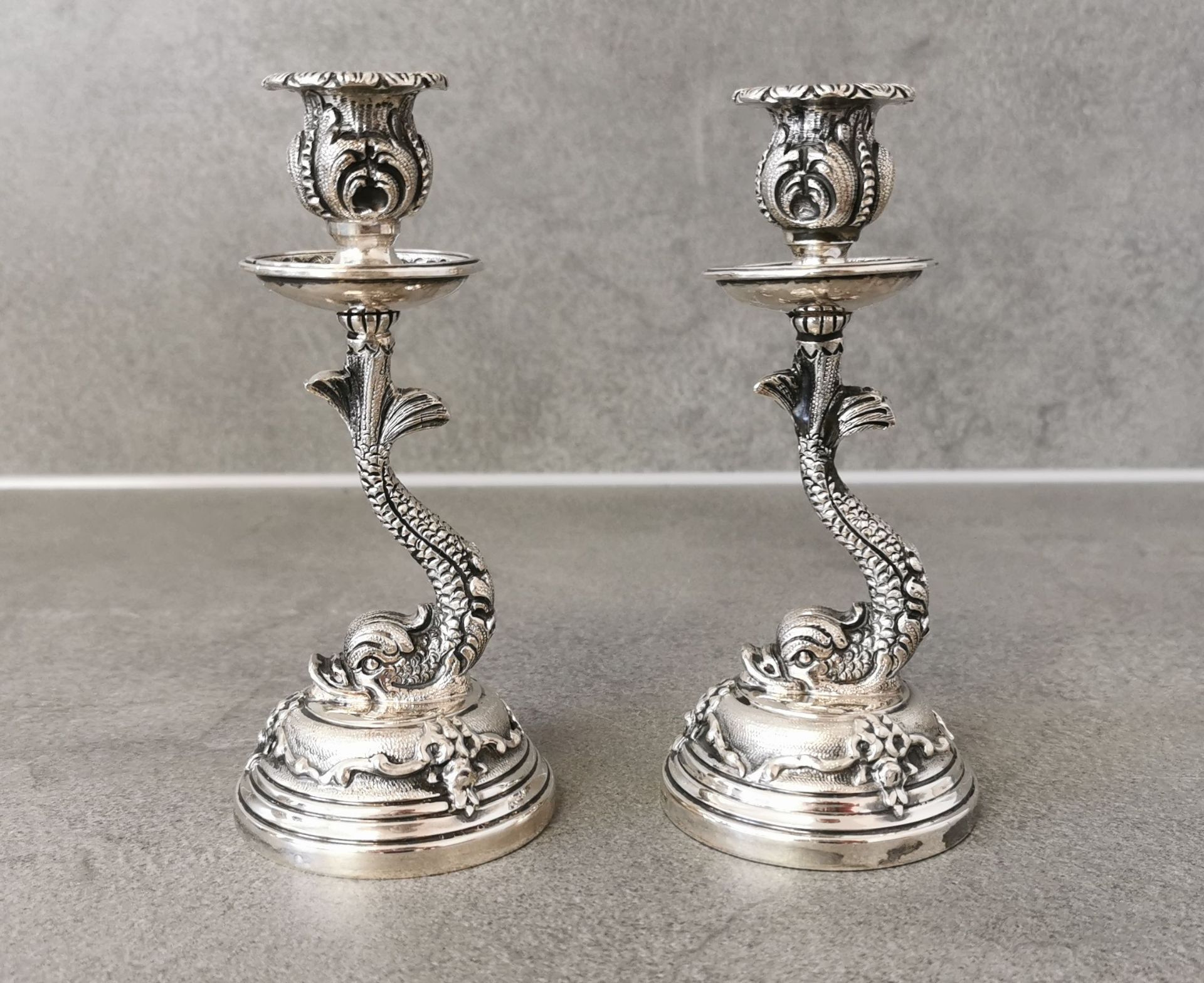 2 CANDLESTICKS IN BAROQUE DESIGN