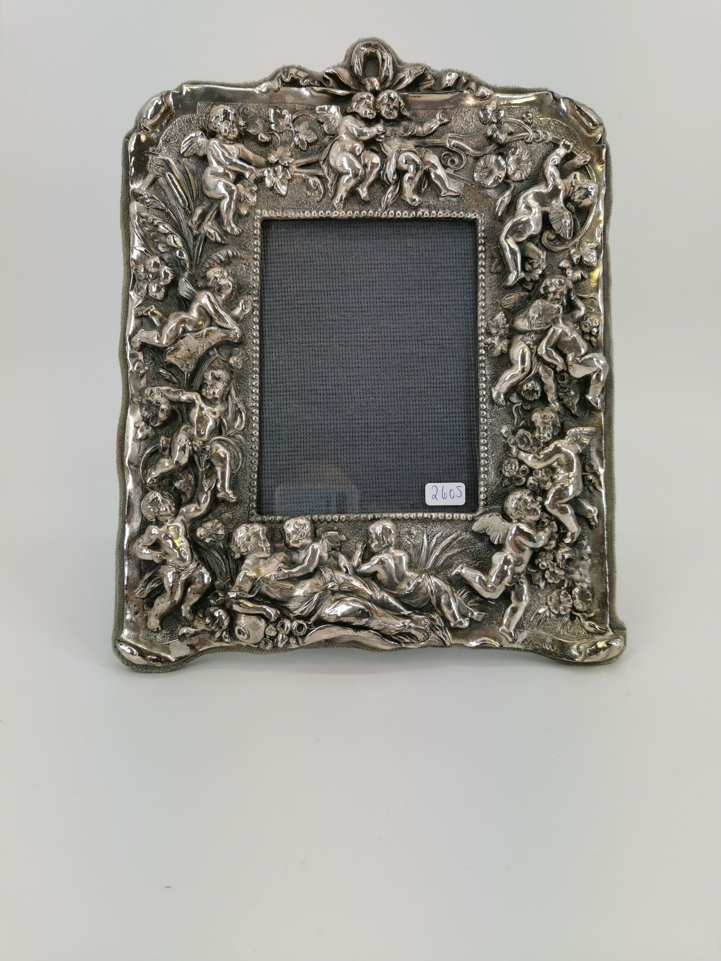 FRAME WITH SILVER RELIEF "MYTHOLOGICAL SCENE WITH PUTTI"