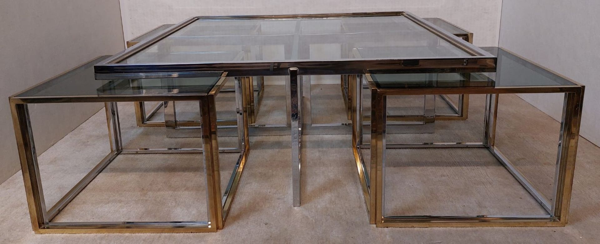 La Maison, coffee table with four set tables.