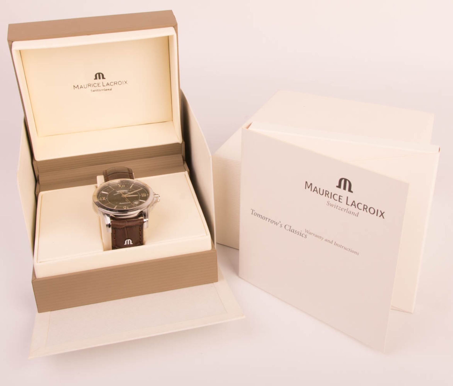 Maurice Lacroix men's wrist watch with box.