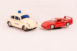 Polizeiauto und Ferrari