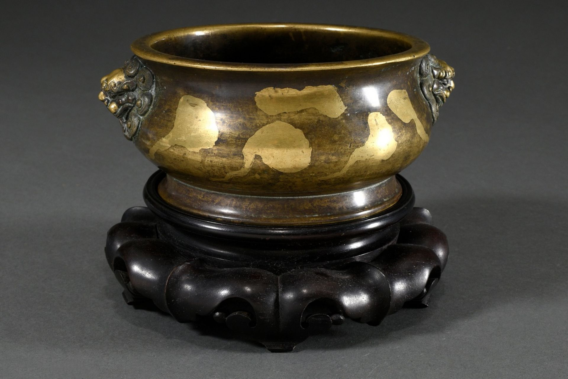 Bronze censer with gold-plated decoration and finely worked lion heads, Qianlong seal mark, on late