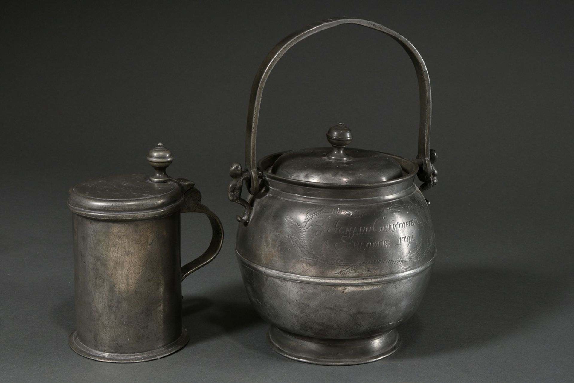 2 Various pieces of Wismar pewter: large hanging pot with figural handles (food carriers) and engra - Image 2 of 11