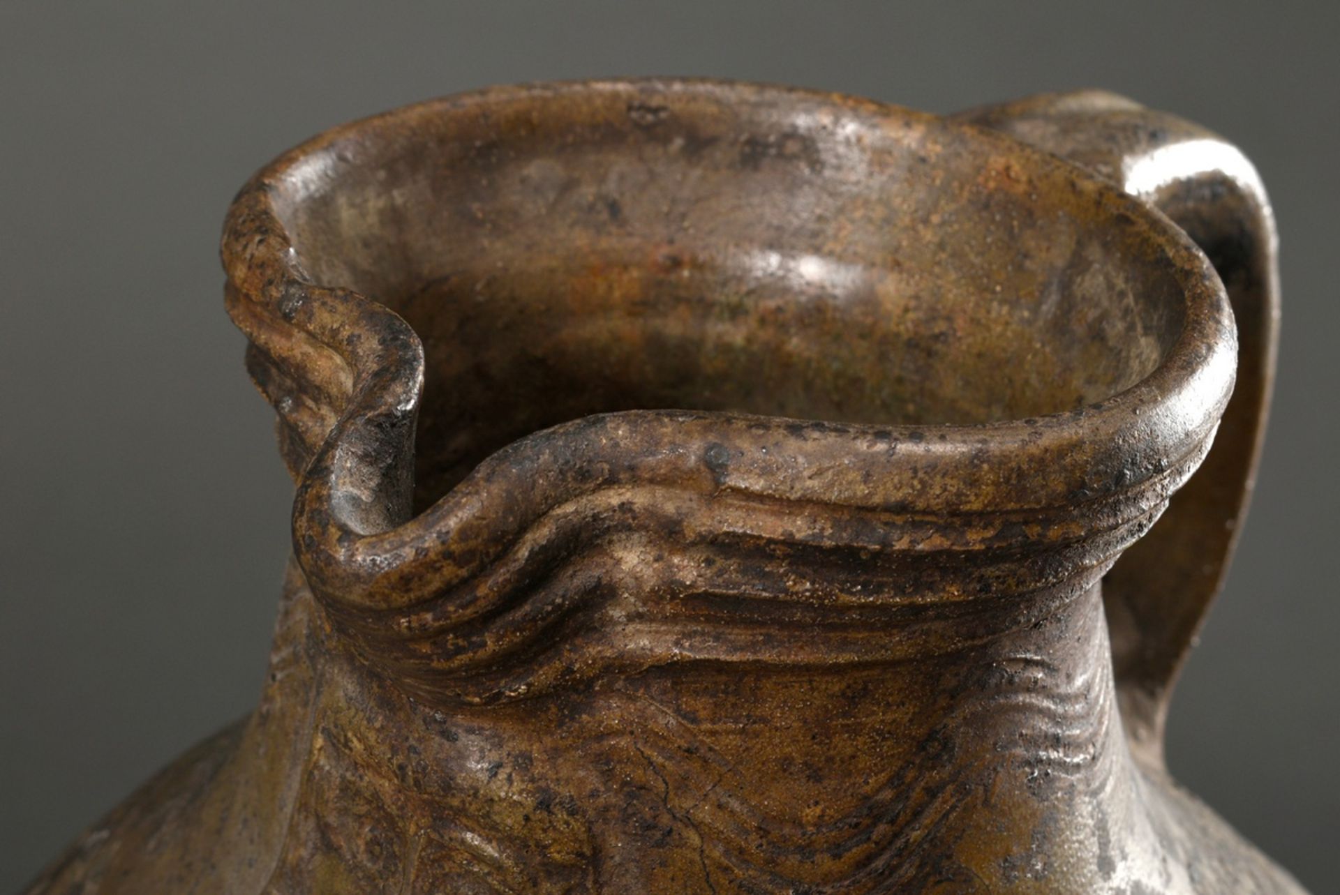 A large Pötzkanne or Bartmann jug with remnants of light brown salt glaze and "Bartmann mask" decor - Image 10 of 12