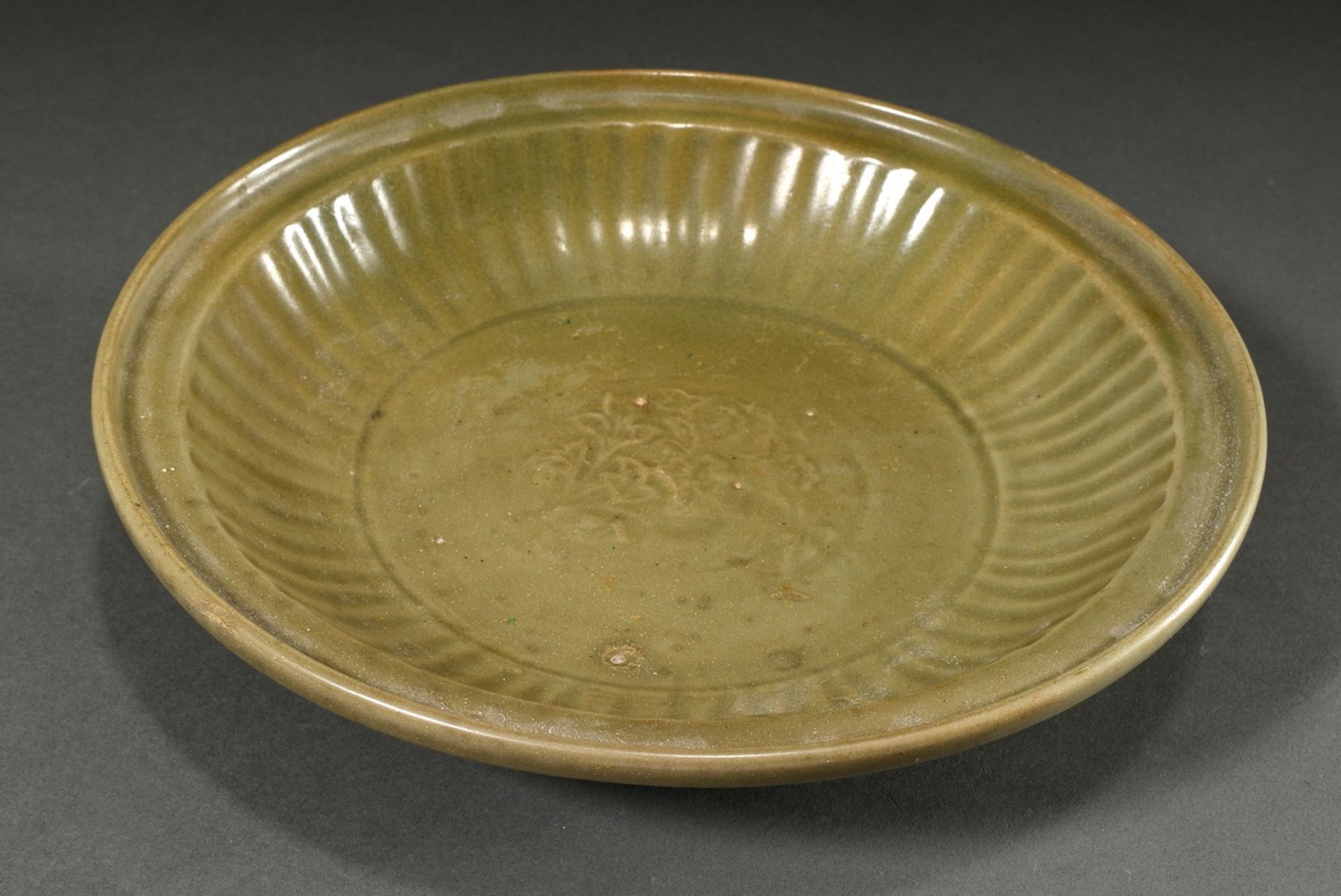 Large Longquan bowl with celadon glaze and grooved rim, modelled floral decoration, China Ming Dyna
