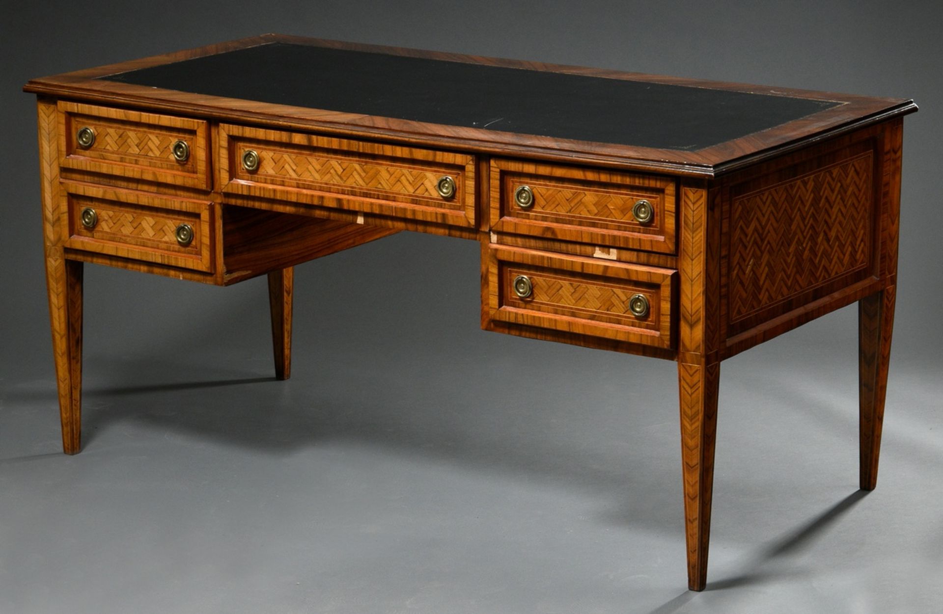 Representative free standing desk in Louis XVI style with herringbone veneer and gold punched leath