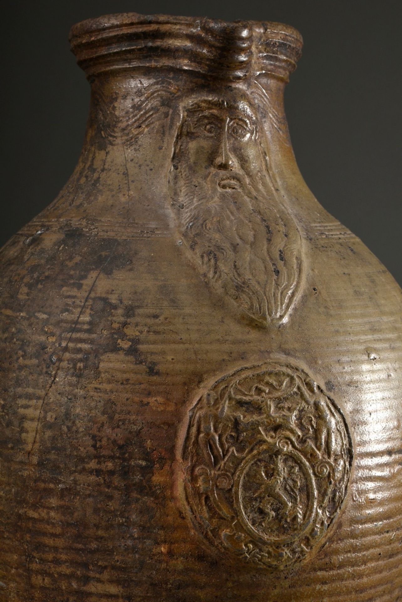A large Pötzkanne or Bartmann jug with remnants of light brown salt glaze and "Bartmann mask" decor - Image 3 of 12