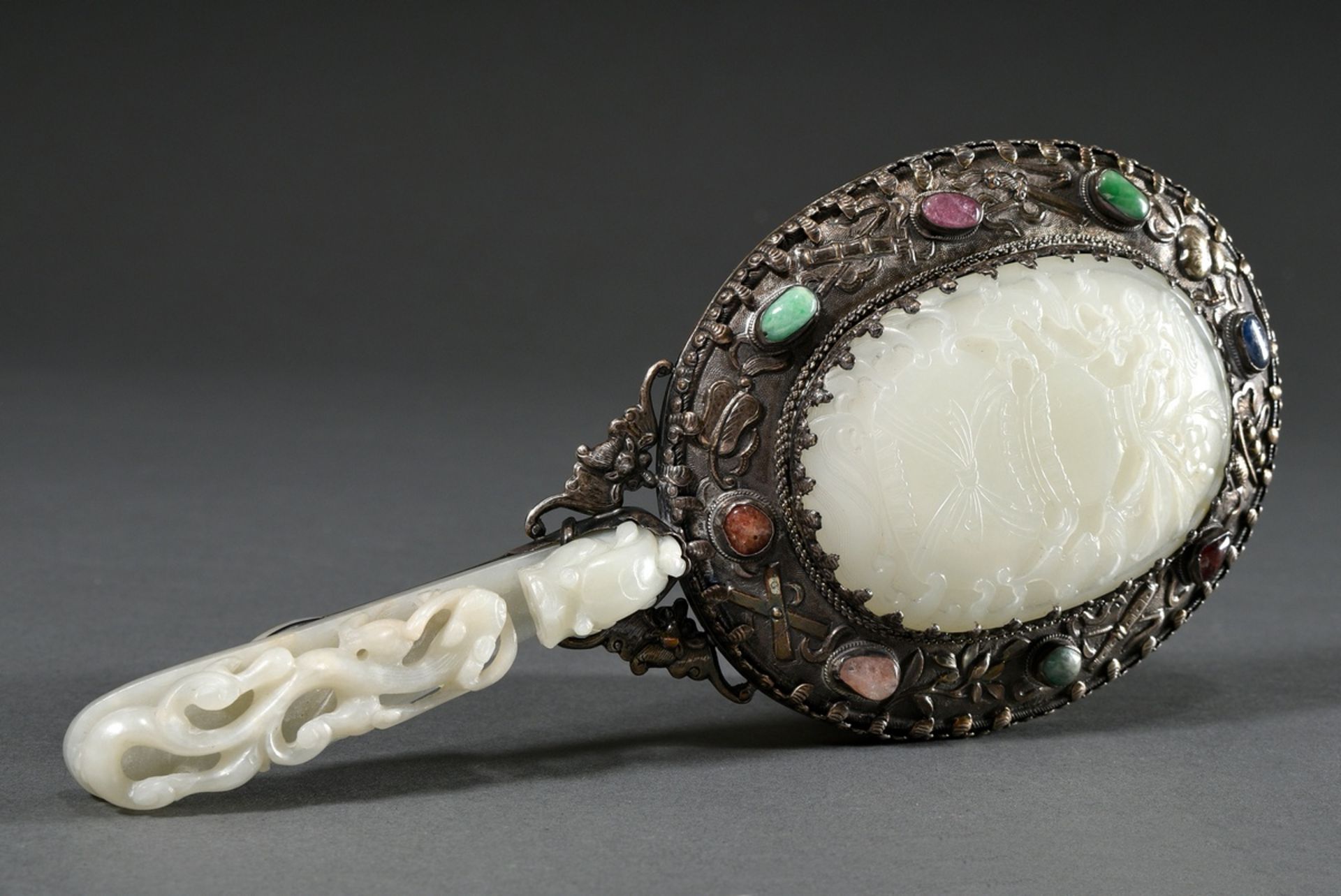 Chinese silver hand mirror with incorporated fine light hetian jade plaque with raised relief "flow