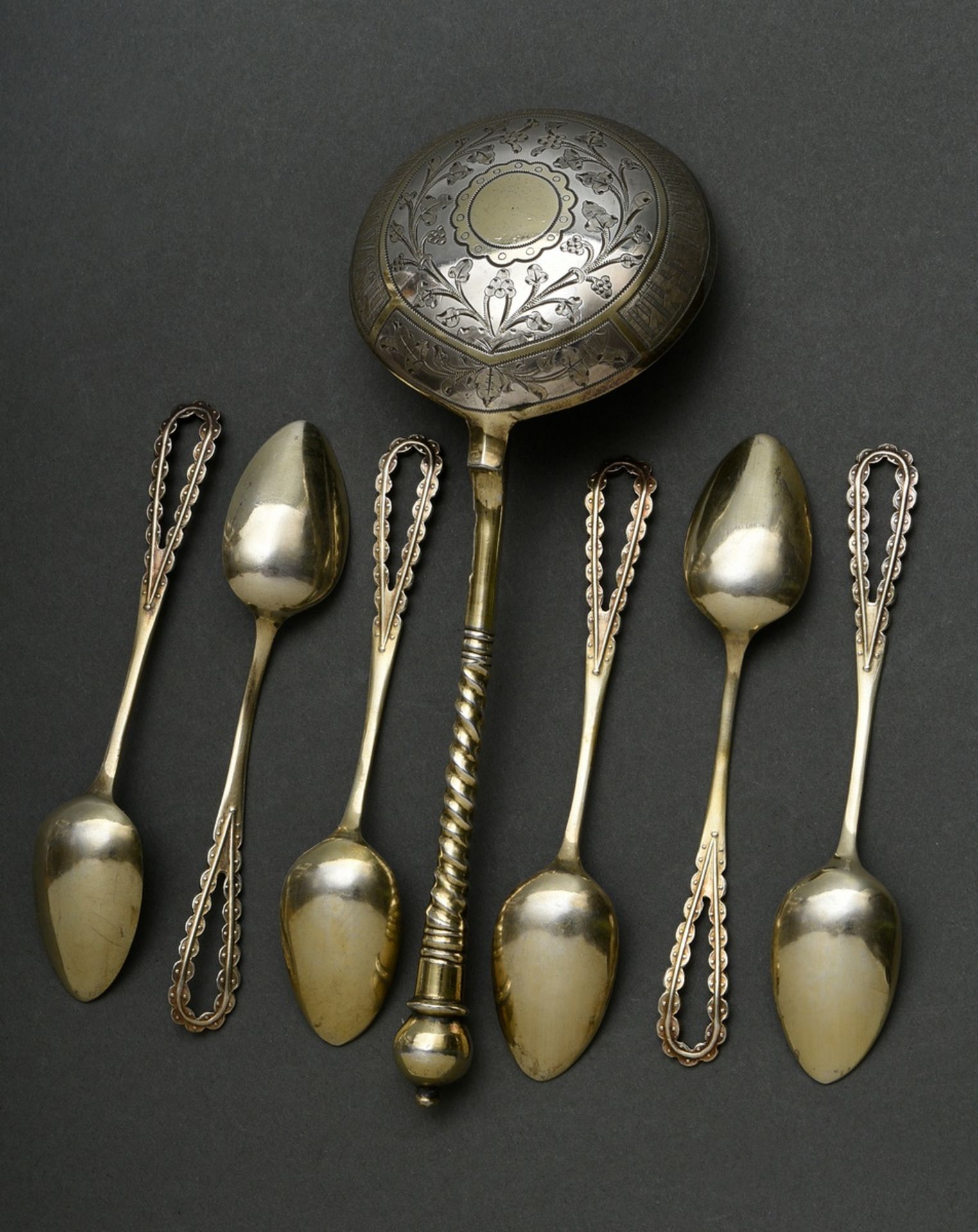 7 Various pieces of gilded cutlery, 19th century: Russian cream spoon with twisted handle and engra - Image 3 of 4