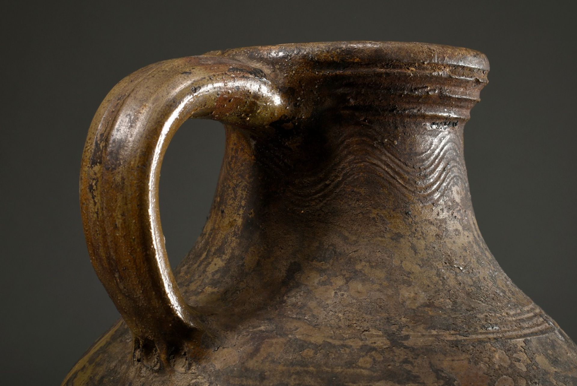 A large Pötzkanne or Bartmann jug with remnants of light brown salt glaze and "Bartmann mask" decor - Image 7 of 12