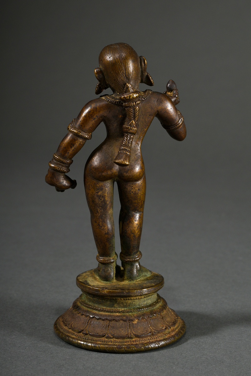 Bronze figure "Sri Devi with lotus blossom in her right hand" on a round lotus base, India 18th c., - Image 3 of 5
