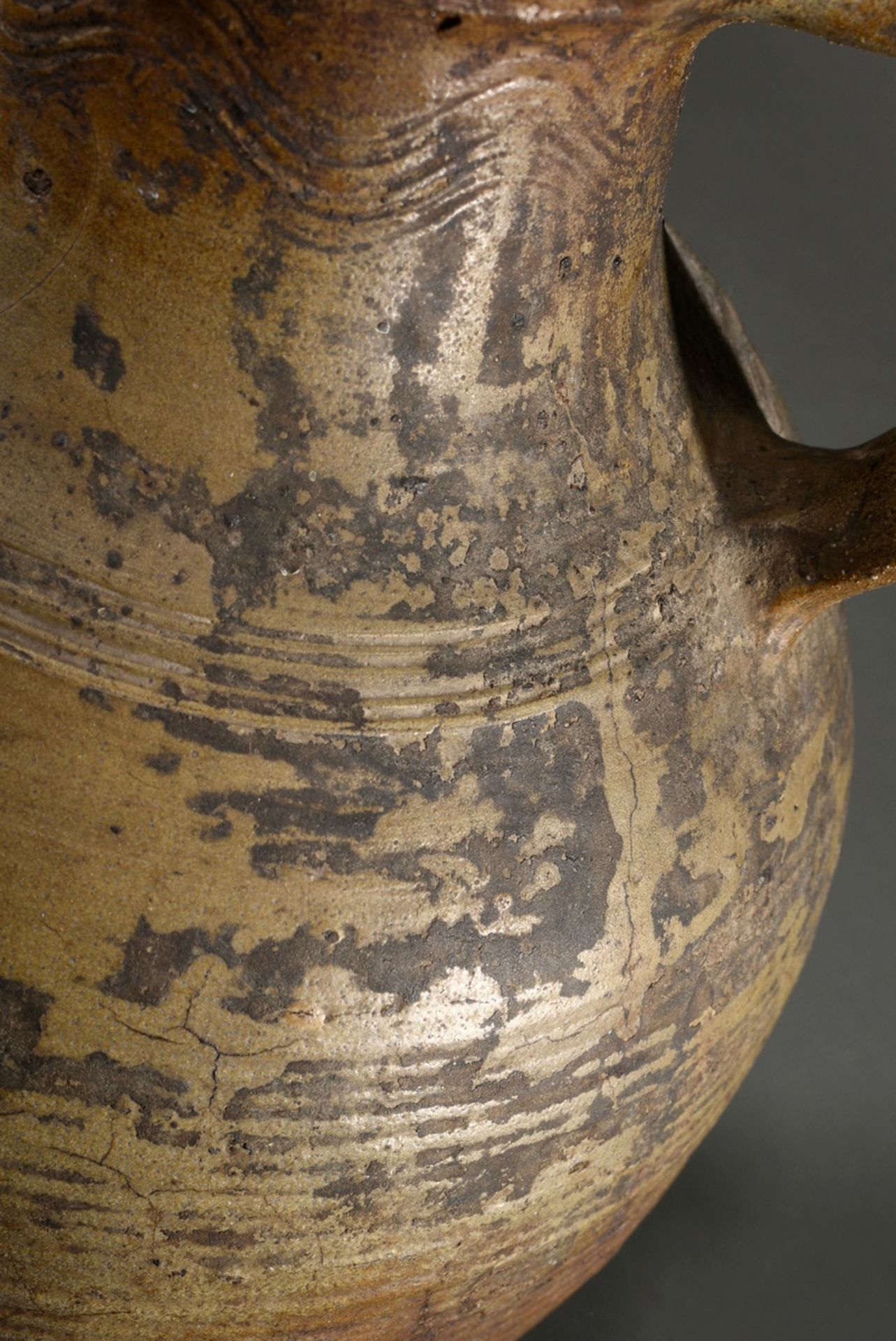 A large Pötzkanne or Bartmann jug with remnants of light brown salt glaze and "Bartmann mask" decor - Image 9 of 12