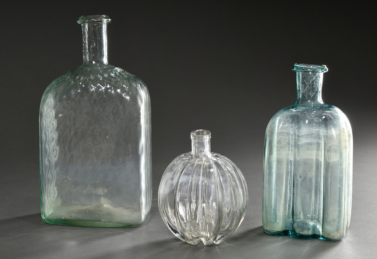 3 Various bottles in square, polygonal and spherical form with honeycomb pattern or groove decorati